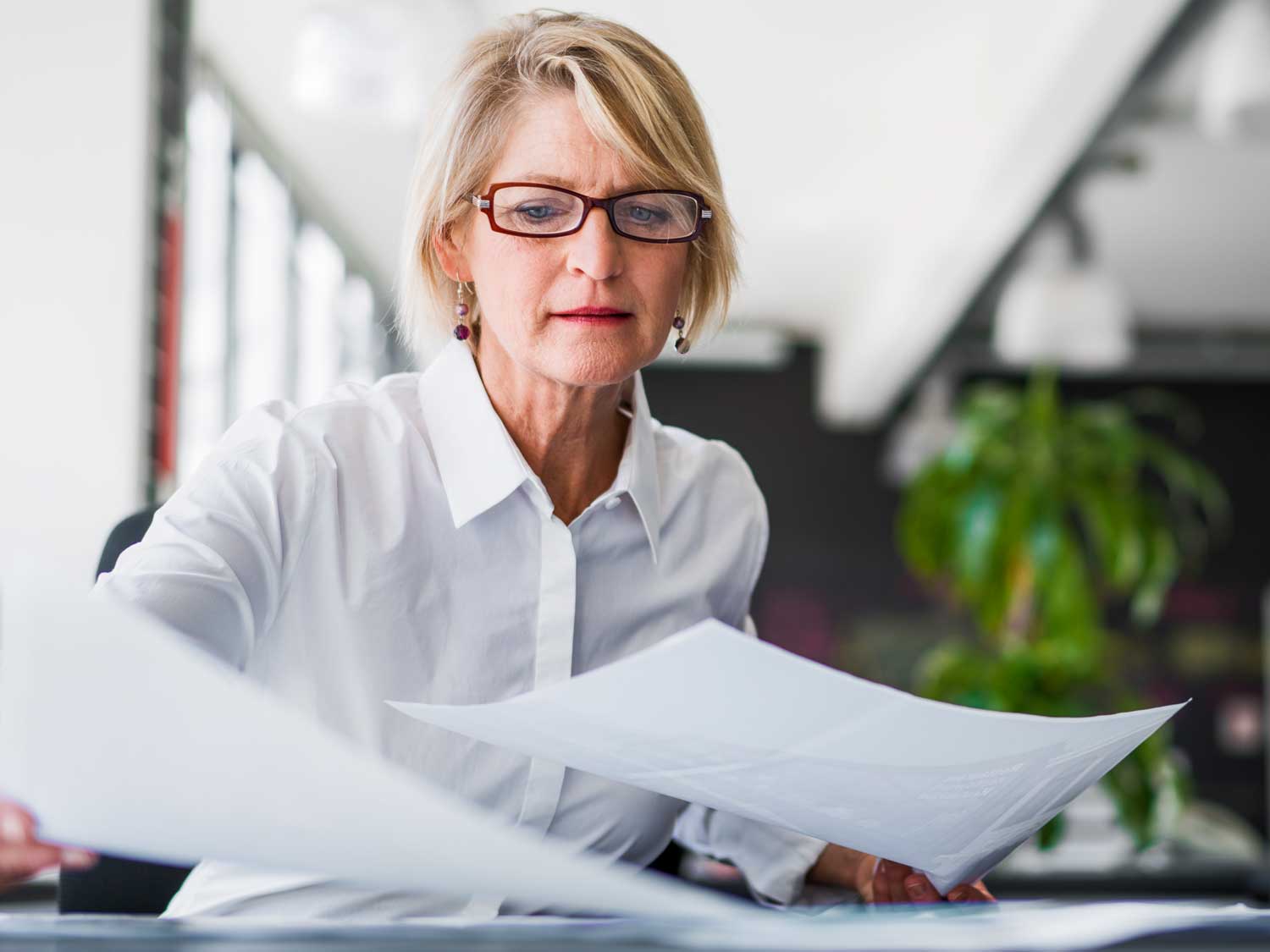Business lady with report Business lady with report